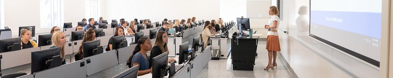 GVSU students participate in a class held in a computer lab on the health campus.